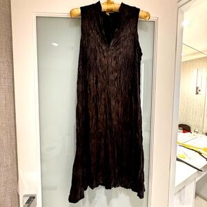 Deep charcoal gray loose fitting dress.